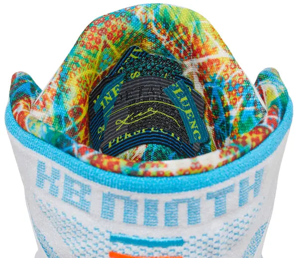 Nike Kobe 9 Elite Protro 'What The Kobe' 2025 high-top with white multicolor Flyknit upper and embroidered heel detailing.