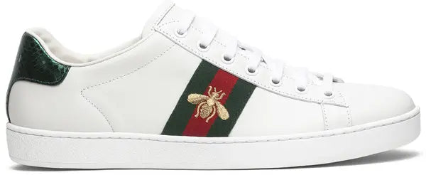 Gucci Wmns Ace Embroidered 'Bee' 2019 sneaker in white leather with gold bee embroidery, Web stripe, and metallic Ayers snakeskin heel tabs.