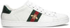 Gucci Wmns Ace Embroidered 'Bee' 2019 sneaker in white leather with gold bee embroidery, Web stripe, and metallic Ayers snakeskin heel tabs.