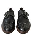 Dolce & Gabbana Zapatos de vestir con tachuelas y correa tipo monje de cuero negro