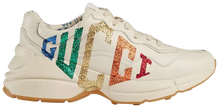 Gucci Wmns Rhyton sneaker in Mystic White leather with glitter Gucci logo and chunky sole.

