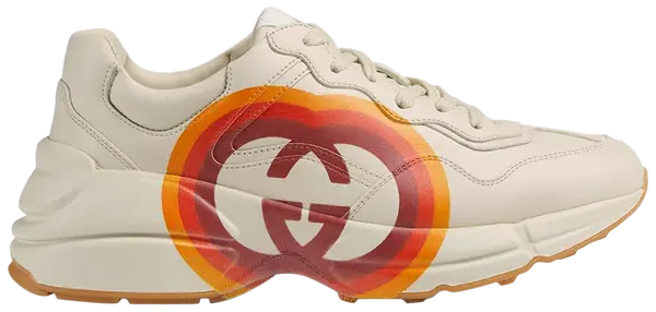 Gucci Wmns Rhyton 'Interlocking G and Hearts' sneaker in white leather with interlocking G logo and red heart graphic on side, chunky rubber sole.

