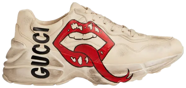 Gucci Wmns Rhyton sneaker in ivory leather with red mouth print graphic and chunky sole.

