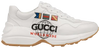 Gucci Wmns Rhyton 'Worldwide' sneaker in ivory leather with multicolor print and gum sole.

