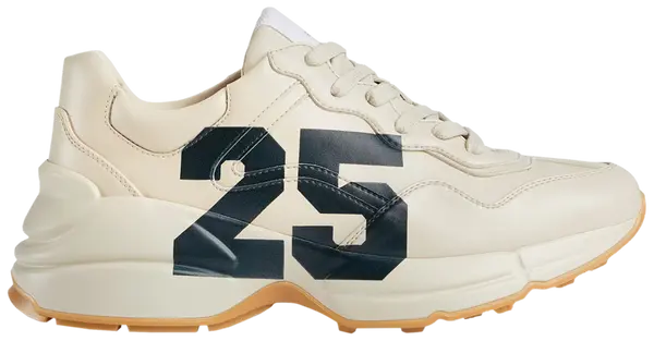 Gucci women’s Rhyton ‘25 - Ivory’ sneaker in sustainable Demetra leather with chunky cream sole and minimalist branding.

