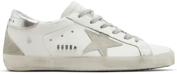 Golden Goose women's white leather sneaker with grey suede star and silver metallic heel tab, distressed outsole.