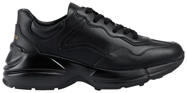 Gucci Wmns Rhyton 'Triple Black' all-black leather sneaker with chunky sole and tonal detailing.

