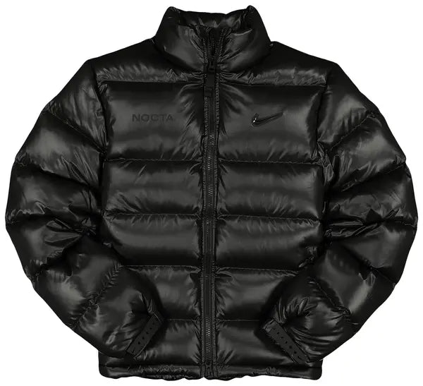 Main Product Shot: Black Nike NOCTA puffer jacket with minimalist quilted design and subtle branding.