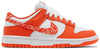 Nike Dunk Low Women’s 'Orange Paisley' sneaker with white leather upper, orange overlays, and paisley print Swoosh.