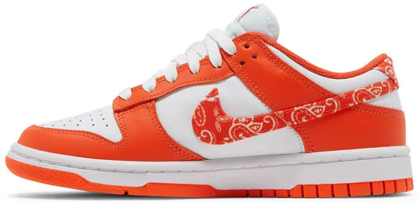 Nike Dunk Low Women’s 'Orange Paisley' sneaker with white leather upper, orange overlays, and paisley print Swoosh.