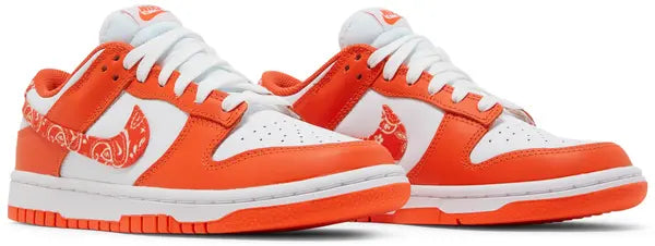 Nike Dunk Low Women’s 'Orange Paisley' sneaker with white leather upper, orange overlays, and paisley print Swoosh.