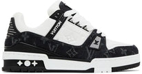 Louis Vuitton Trainer 'Denim Noir' 2022 sneaker with white leather upper, black denim panels, and tonal monogram details.

