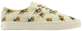 Golf Le Fleur x Converse Naut-1 'Darryl' sneaker in cream canvas with pastel yellow and bright gold accents, showcasing Le Fleur and Darryl all-over print.

