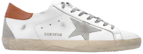 Golden Goose Superstar sneaker in white leather with light brown suede star and grey heel tab, vintage scuffed sole.