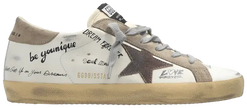 Golden Goose Wmns Superstar sneaker in white leather with taupe suede star and cinder heel, featuring a pre-distressed sole.