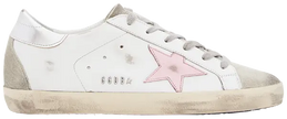 Golden Goose women’s Superstar sneaker in white leather with orchid lining, silver star, pink heel tab, and vintage-style distressing.

