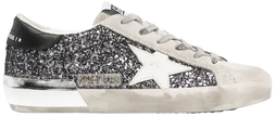 Golden Goose Wmns Superstar sneaker in silver glitter with black star and grey suede accents, distressed finish.