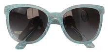 Dolce & Gabbana Elegantes gafas de sol con detalle de encaje azul