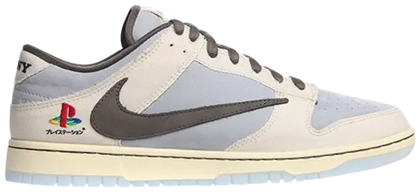 Travis Scott x Playstation x Dunk Low in cream with PlayStation logo, katakana text, and translucent outsole.
