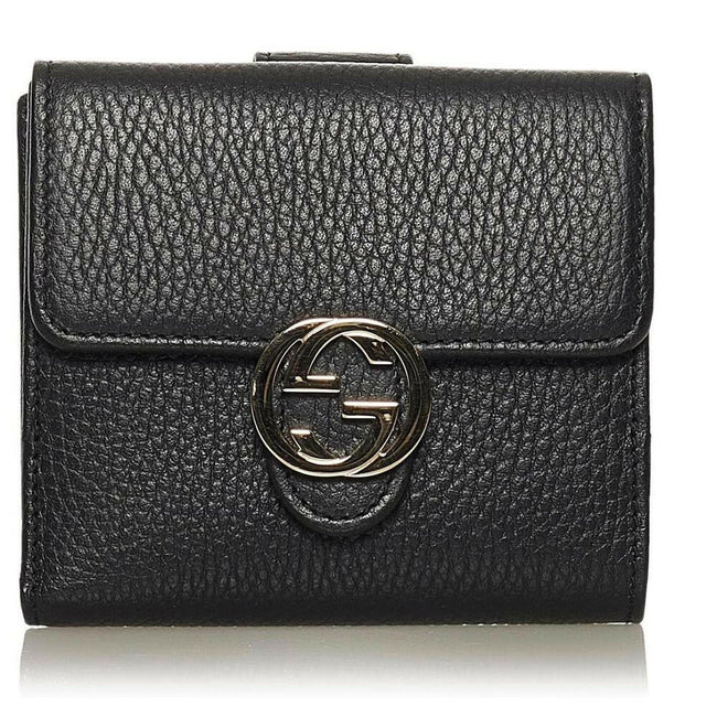 Gucci Elegant Bifold Leather Wallet with Coin Purse.